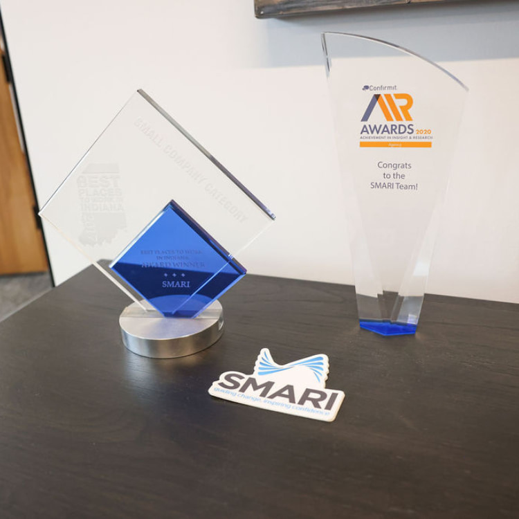 Award trophies SMARI has won on a table in their office